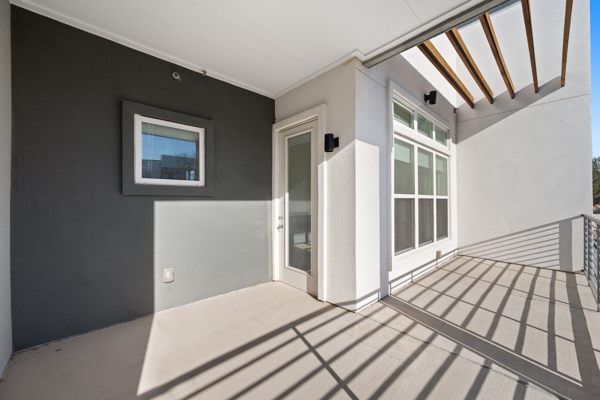 4901 Springdale Road, Unit 106 Austin, TX 78723 - Photo 23 of 40 a view of a hallway with wooden floor and staircase
