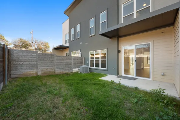 a view of a back yard of the house