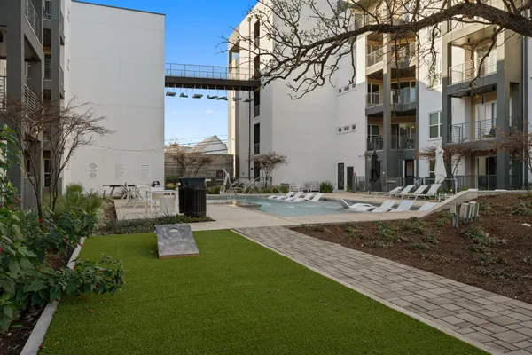 a view of a building with a yard