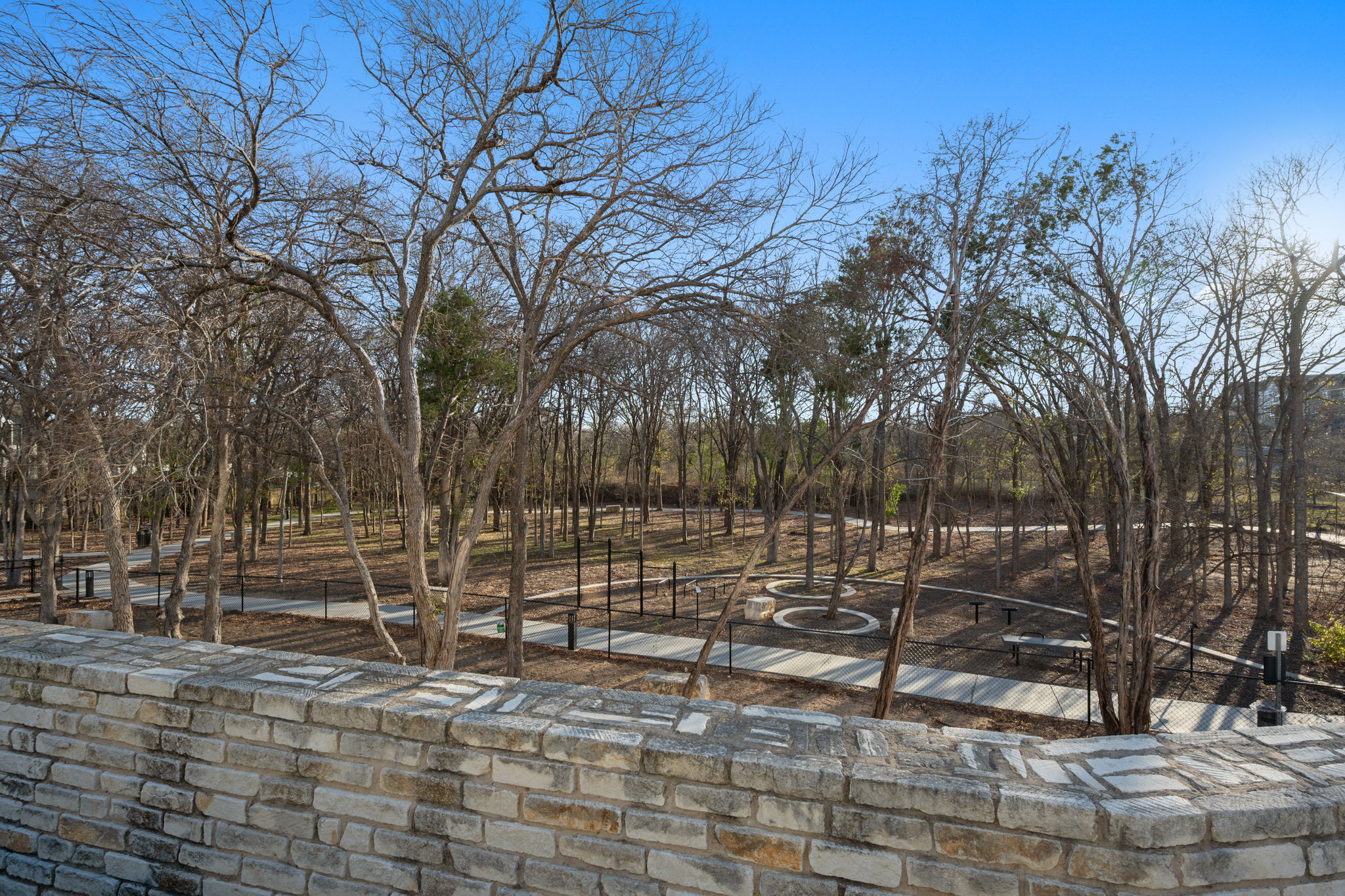 4901 Springdale Road, Unit 106 Austin, TX 78723 - Photo 37 of 40 a view of outdoor space with trees