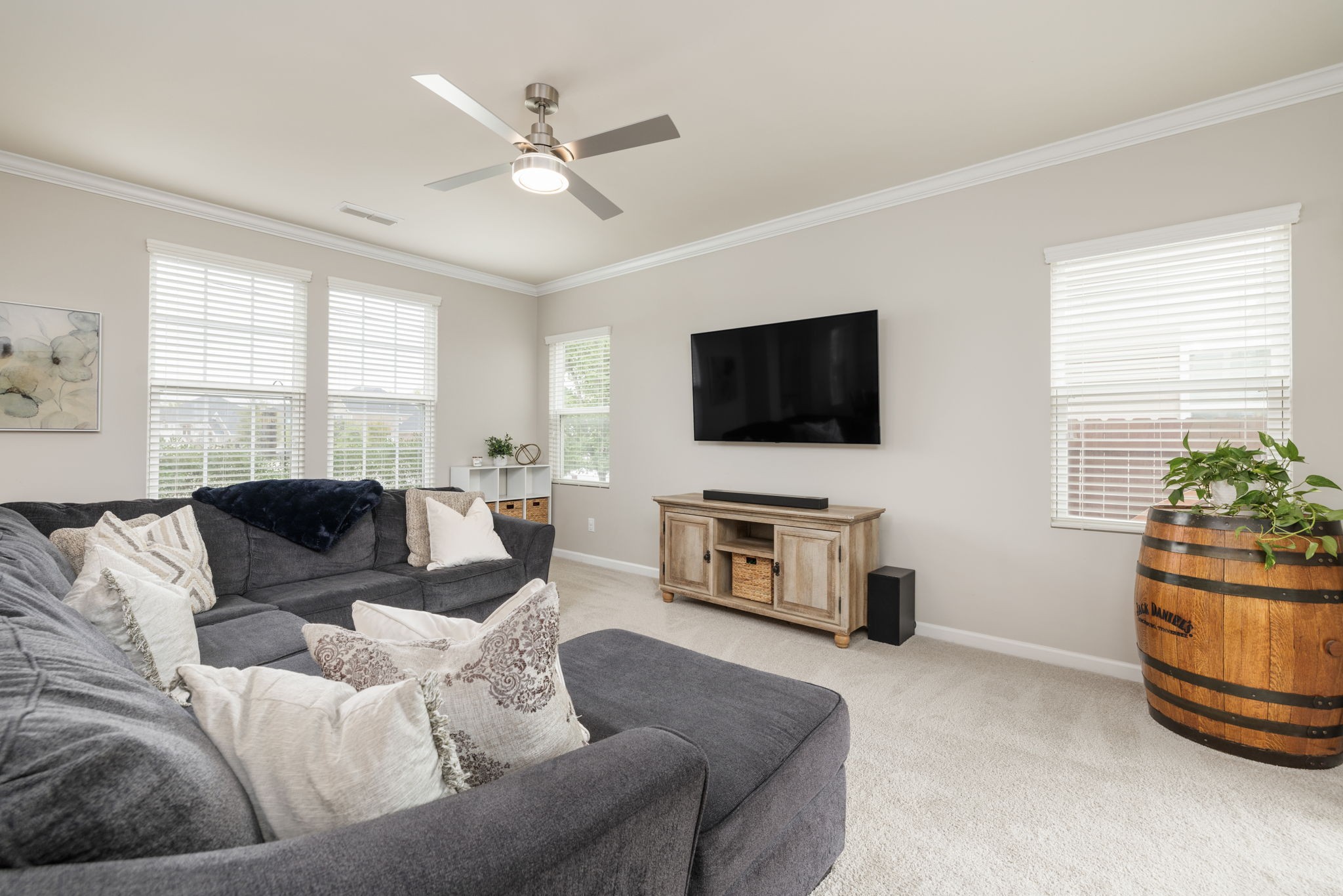 3760 Hoggett Ford Road Hermitage, TN 37076 - Photo 13 of 49 a living room with furniture a flat screen tv and a window