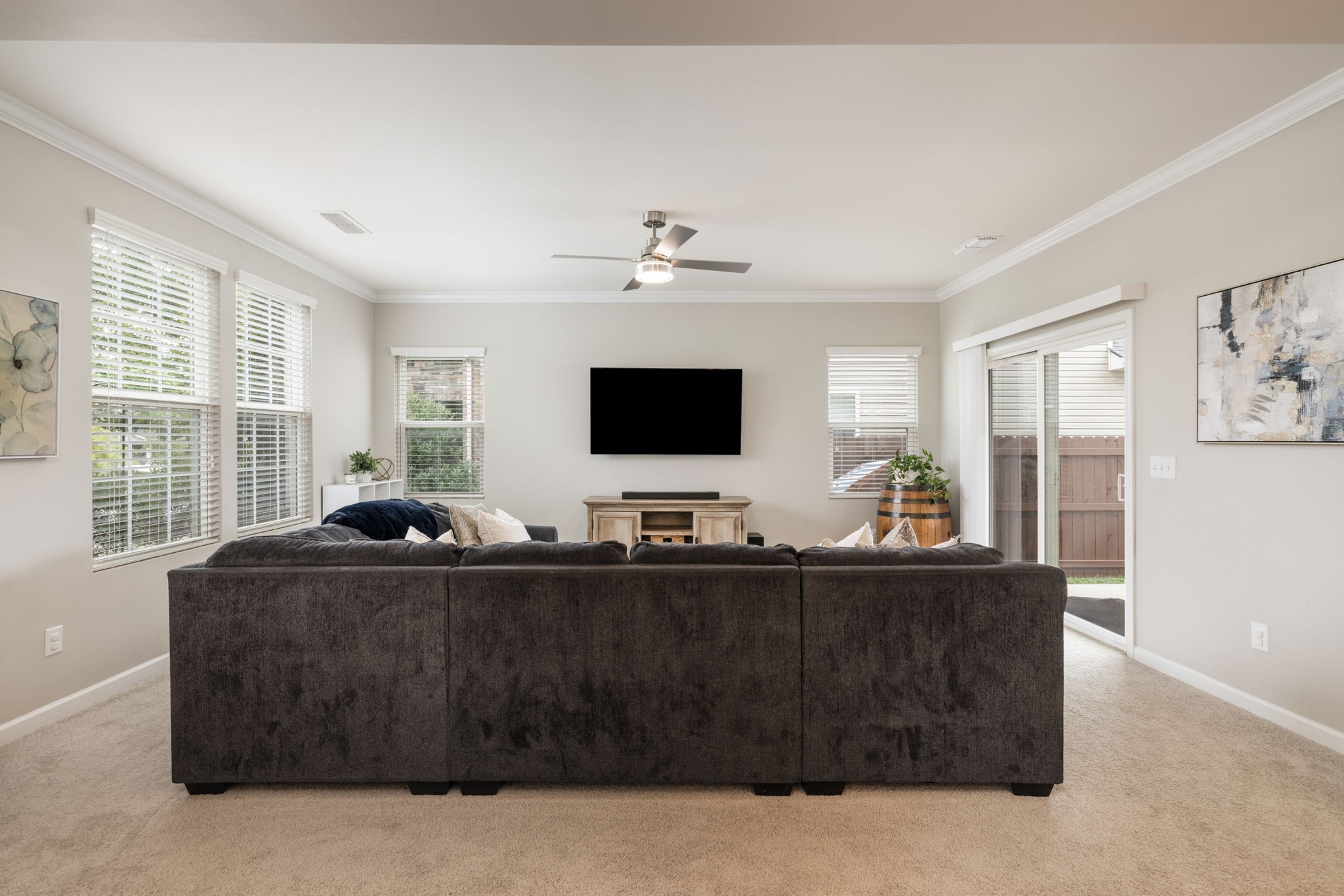 3760 Hoggett Ford Road Hermitage, TN 37076 - Photo 14 of 49 a living room with furniture and a flat screen tv