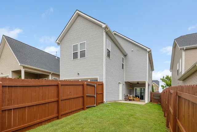 a bathroom with a sink a mirror and a shower