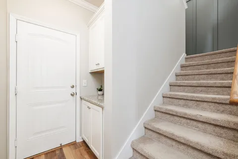 a view of a fountain in front of a house