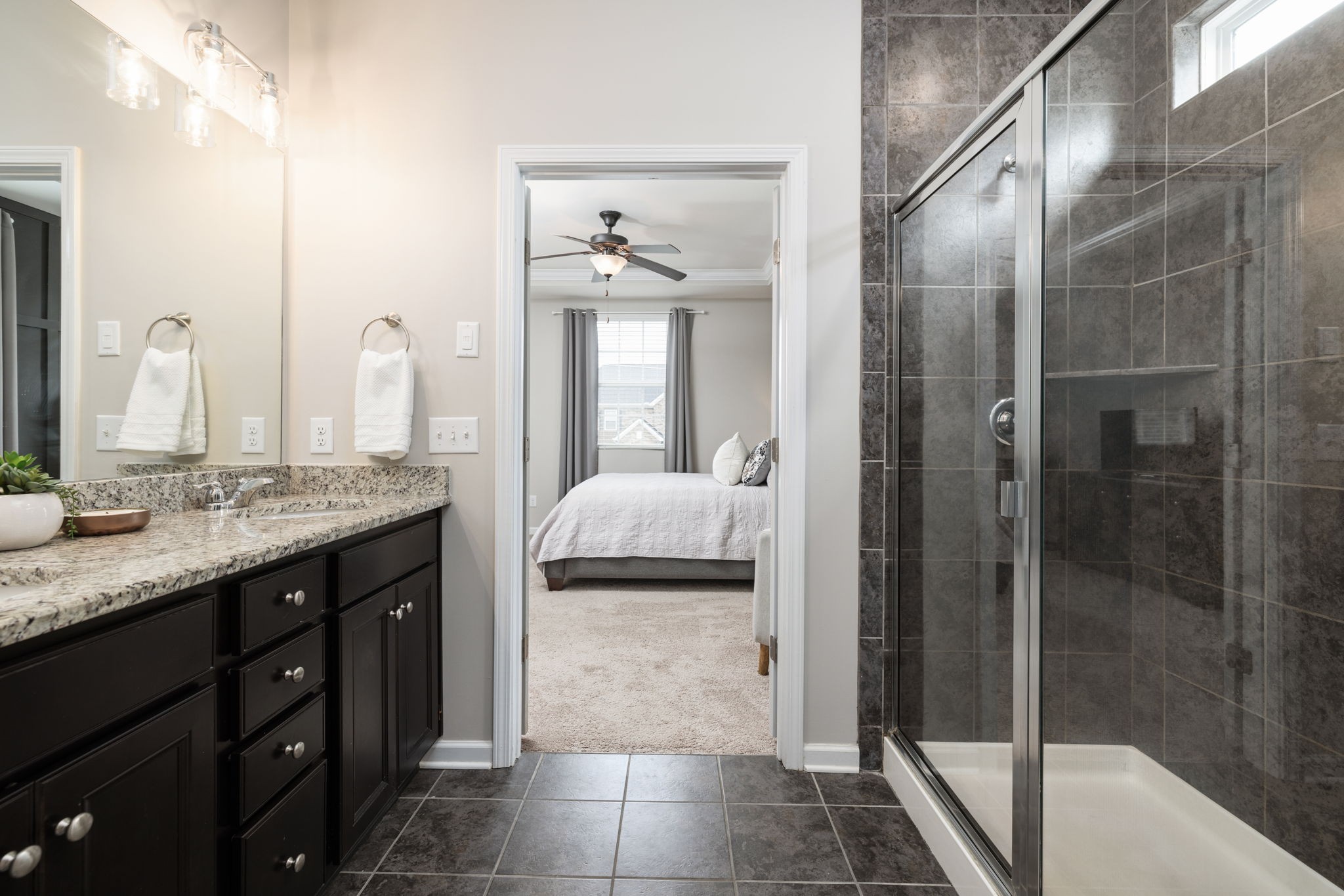 3760 Hoggett Ford Road Hermitage, TN 37076 - Photo 30 of 49 a bathroom with a granite countertop sink and a mirror