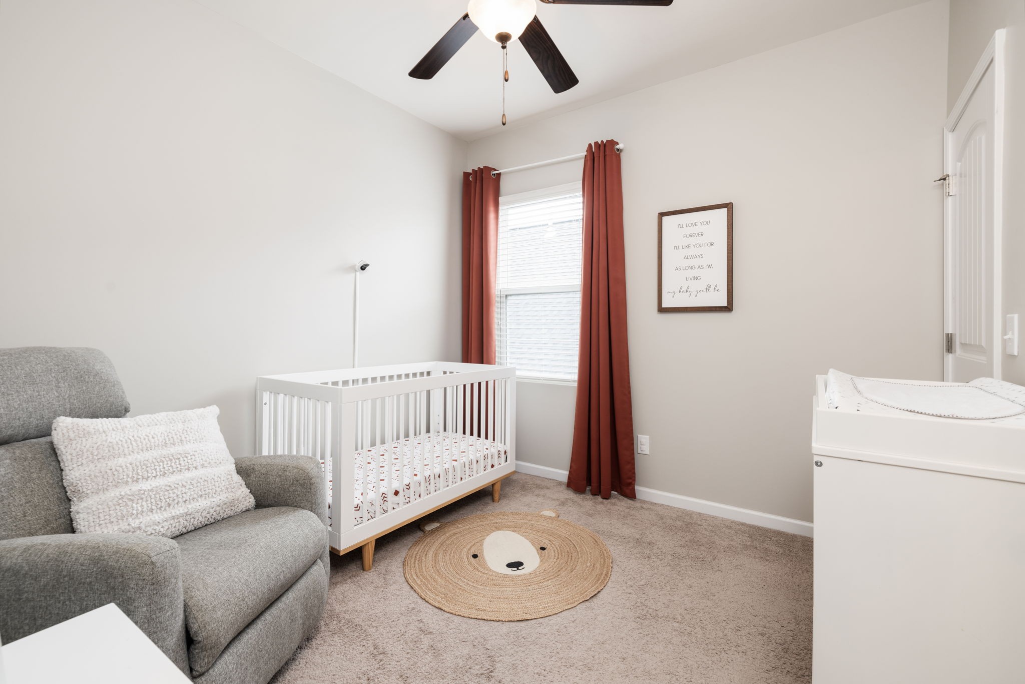 3760 Hoggett Ford Road Hermitage, TN 37076 - Photo 35 of 49 a living room with furniture and a baby crib