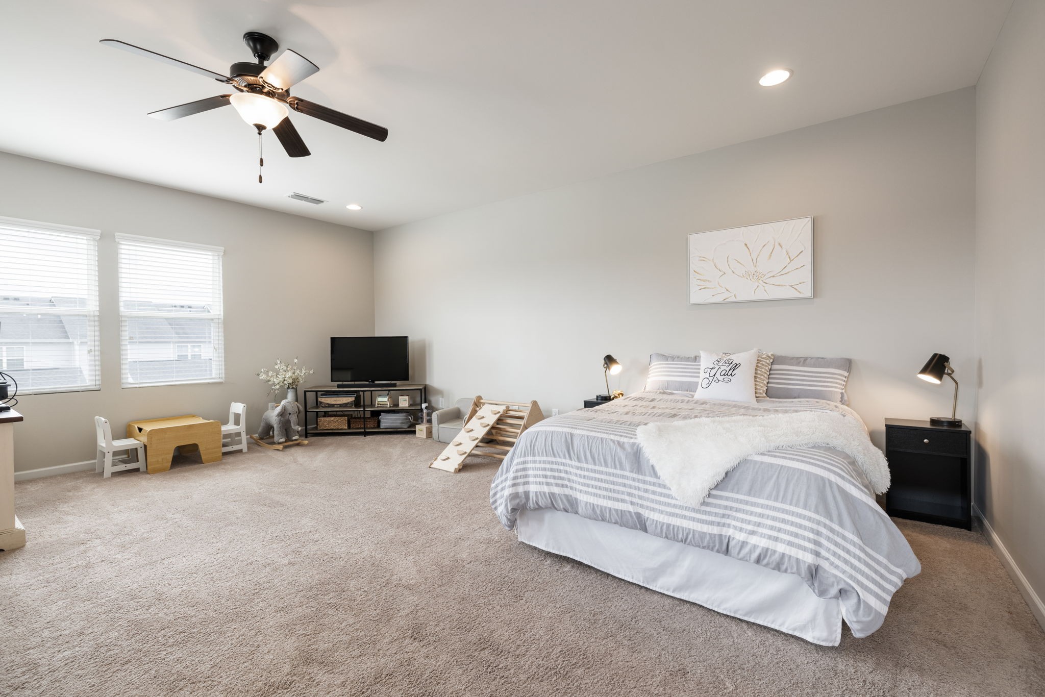 3760 Hoggett Ford Road Hermitage, TN 37076 - Photo 36 of 49 a bedroom with bed and a chandelier