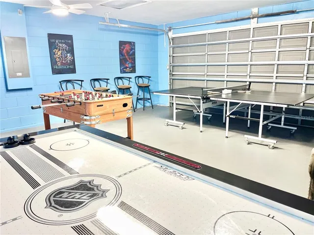 a room with table and chairs