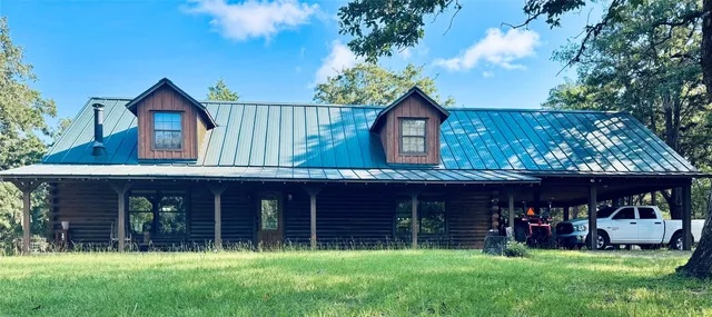 a view of a tiny house with a trees