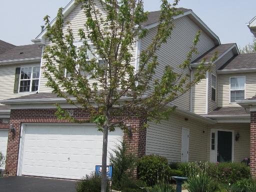 279 Ridge Road North Aurora, IL 60542 - Photo 1 of 16 a view of house with street