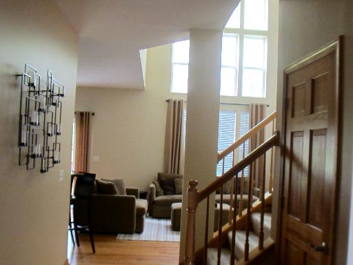 279 Ridge Road North Aurora, IL 60542 - Photo 2 of 16 a view of entryway and hall with wooden floor