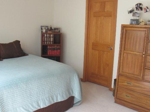 279 Ridge Road North Aurora, IL 60542 - Photo 13 of 16 a bedroom with a bed and wooden floor