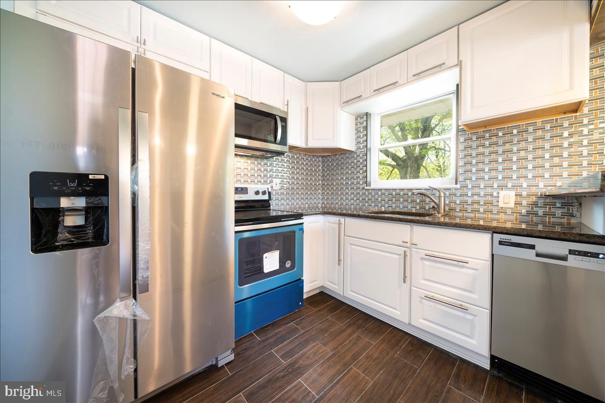 9234 Riggs Road Adelphi, MD 20783 - Photo 14 of 29 Kitchen with brand new Appliance