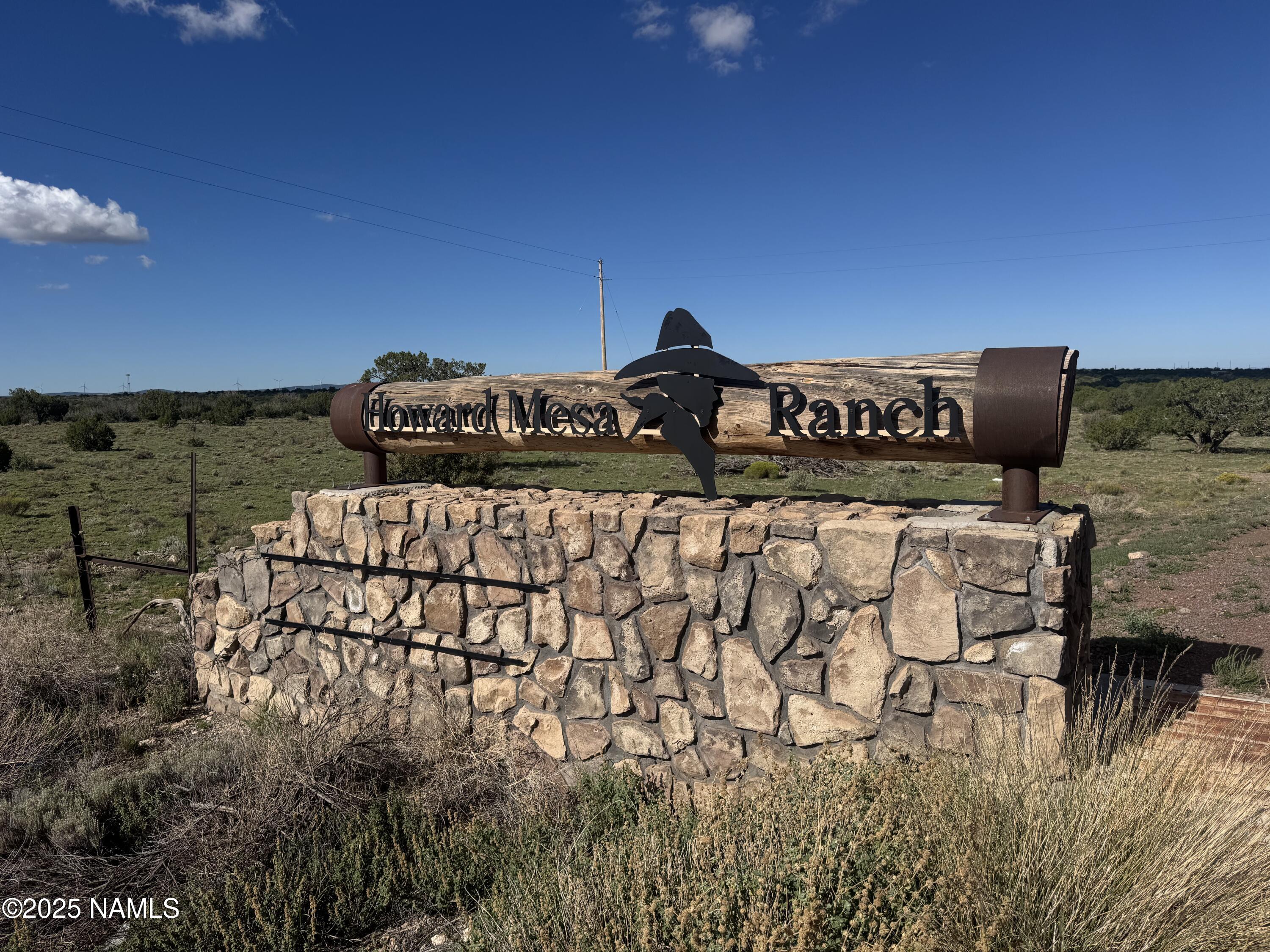 3132 Apollo Avenue Williams, AZ 86046 - Photo 2 of 7 a bed sitting in a field next to a building