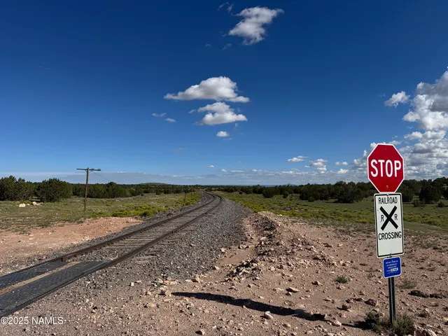 a view of a street with an ocean view