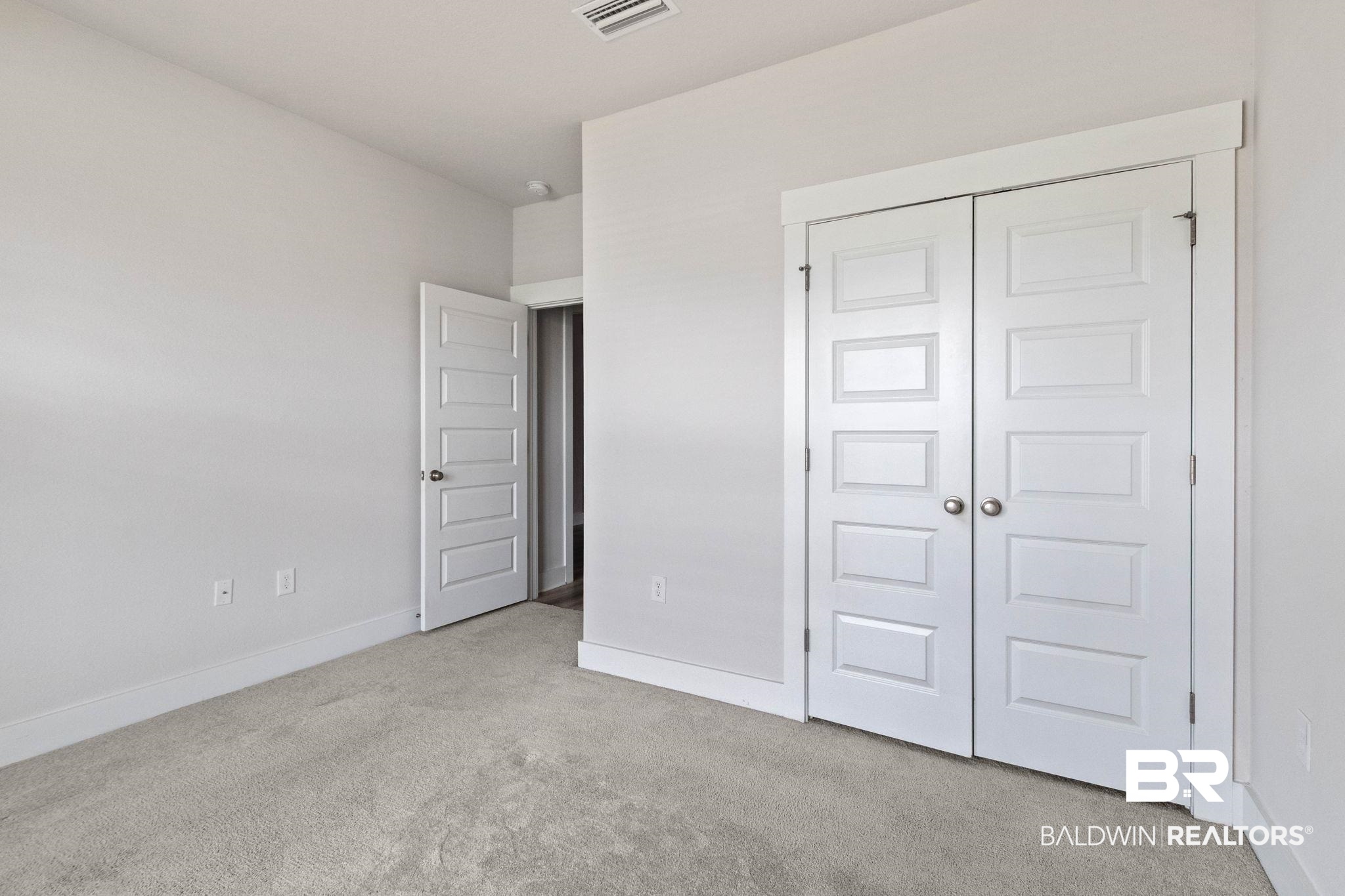1710 Grouse Street Foley, AL 36535 - Photo 55 of 76 Plush carpeted flooring complements light-toned walls