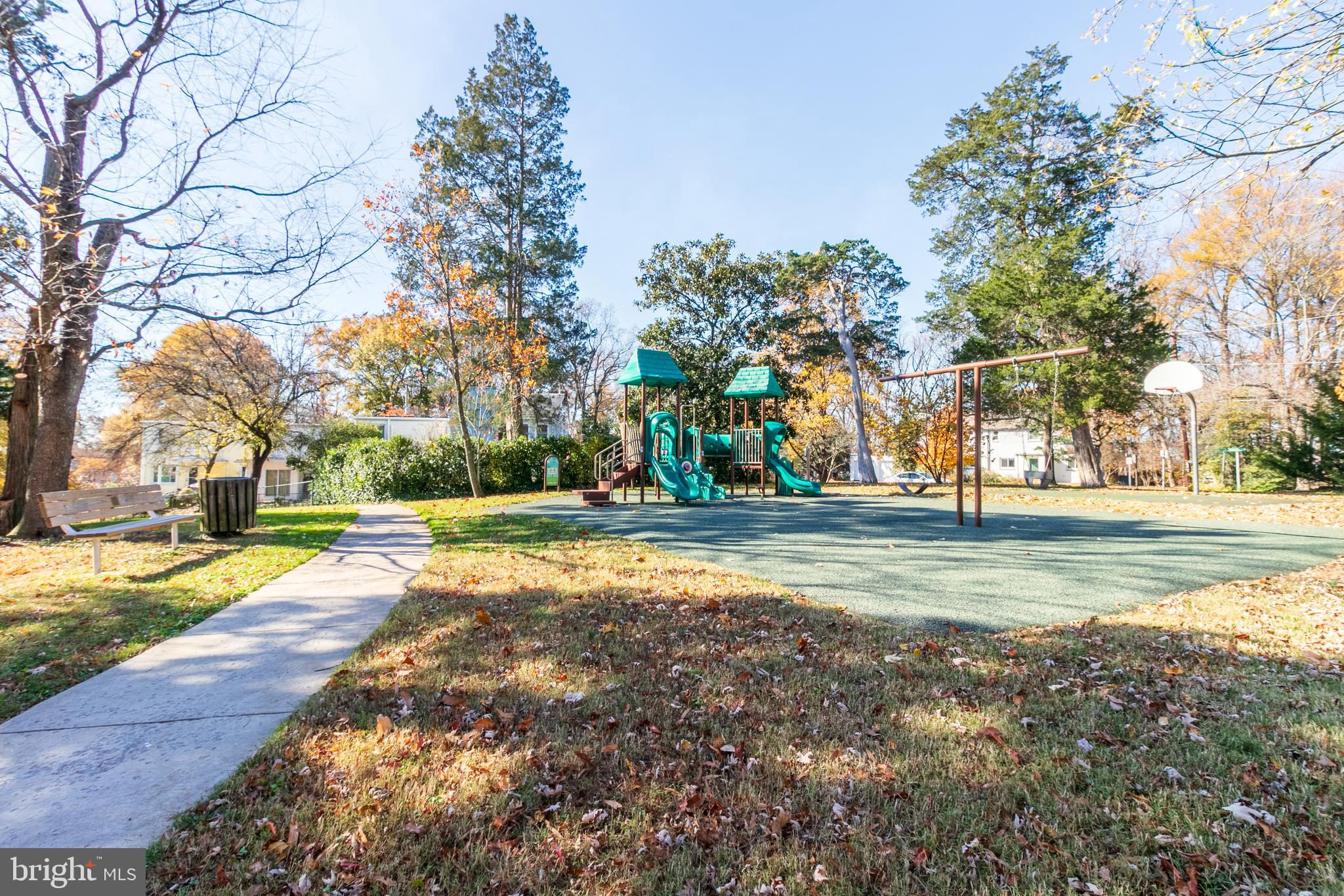 3 Ridge Road Greenbelt, MD 20770 - Photo 14 of 16 a view of a yard with large trees