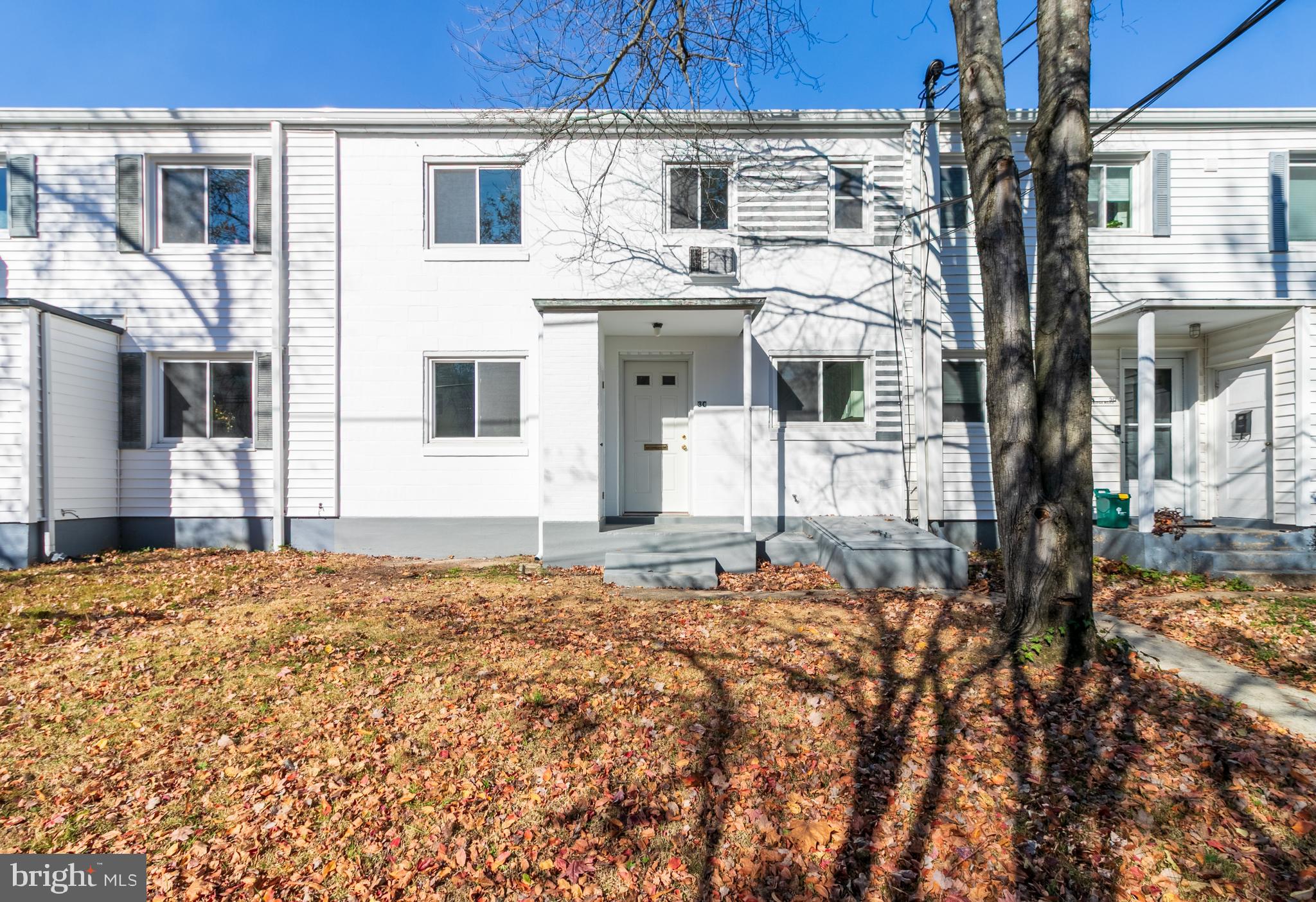 3 Ridge Road Greenbelt, MD 20770 - Photo 15 of 16 a front view of a house with a yard