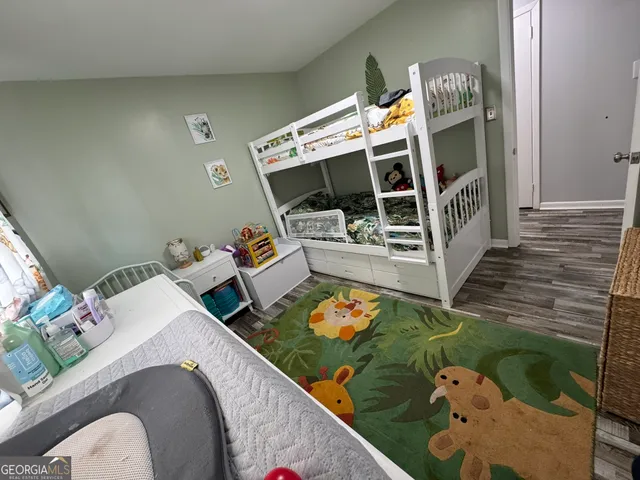 view of living room with furniture and a fireplace