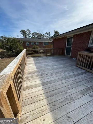 a view of balcony with furniture