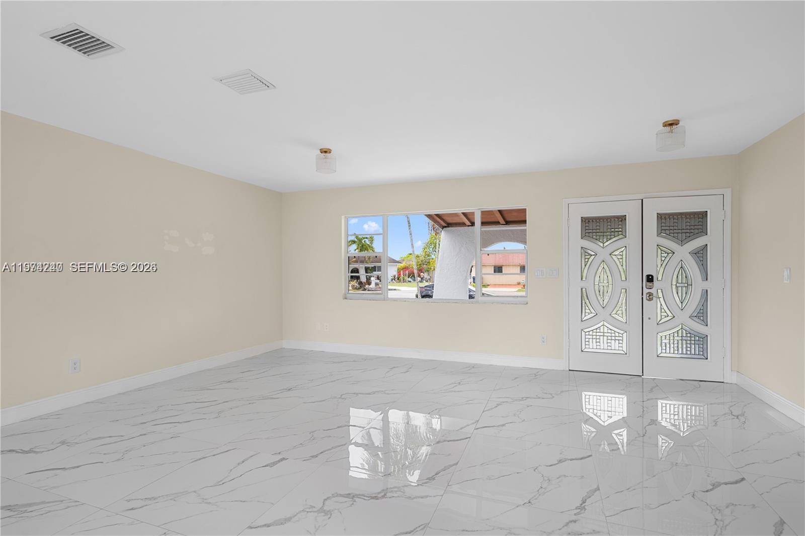 10700 Southwest 70th Street Miami, FL 33173 - Photo 3 of 19 a view of a hallway with closet