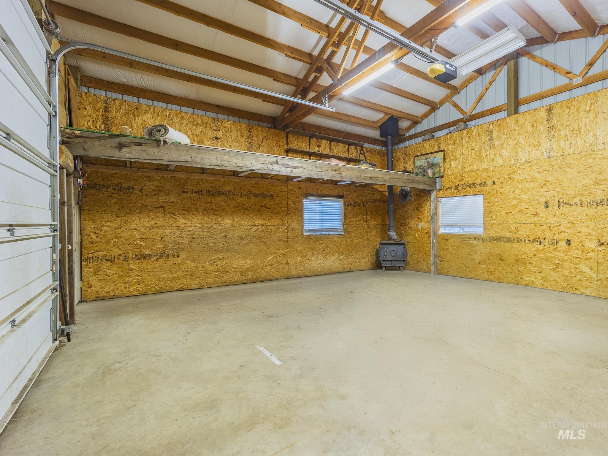 161 Cemetery Road White Bird, ID 83554 - Photo 36 of 48 Garage featuring a garage door opener