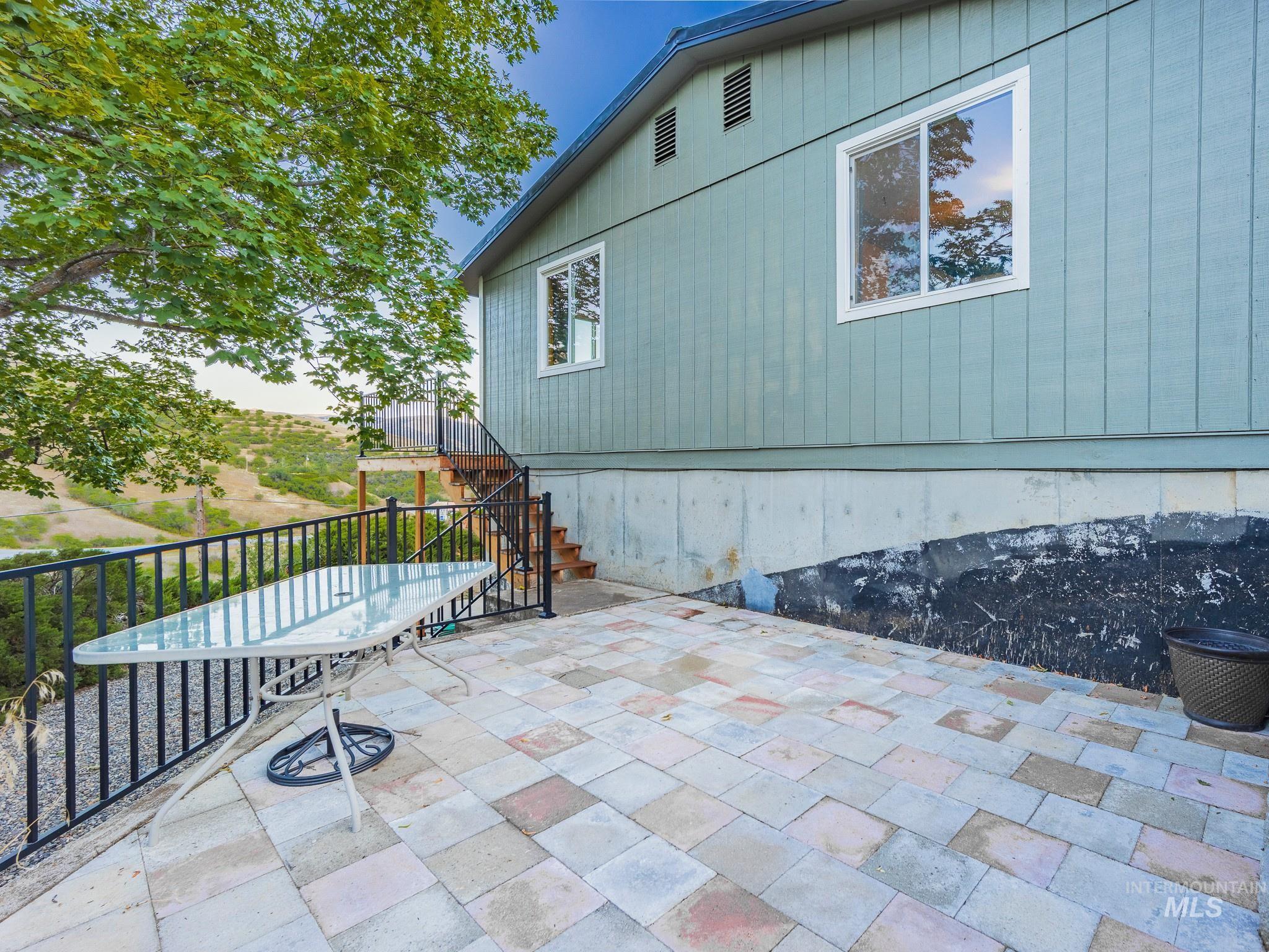 161 Cemetery Road White Bird, ID 83554 - Photo 7 of 48 View of patio featuring stairs