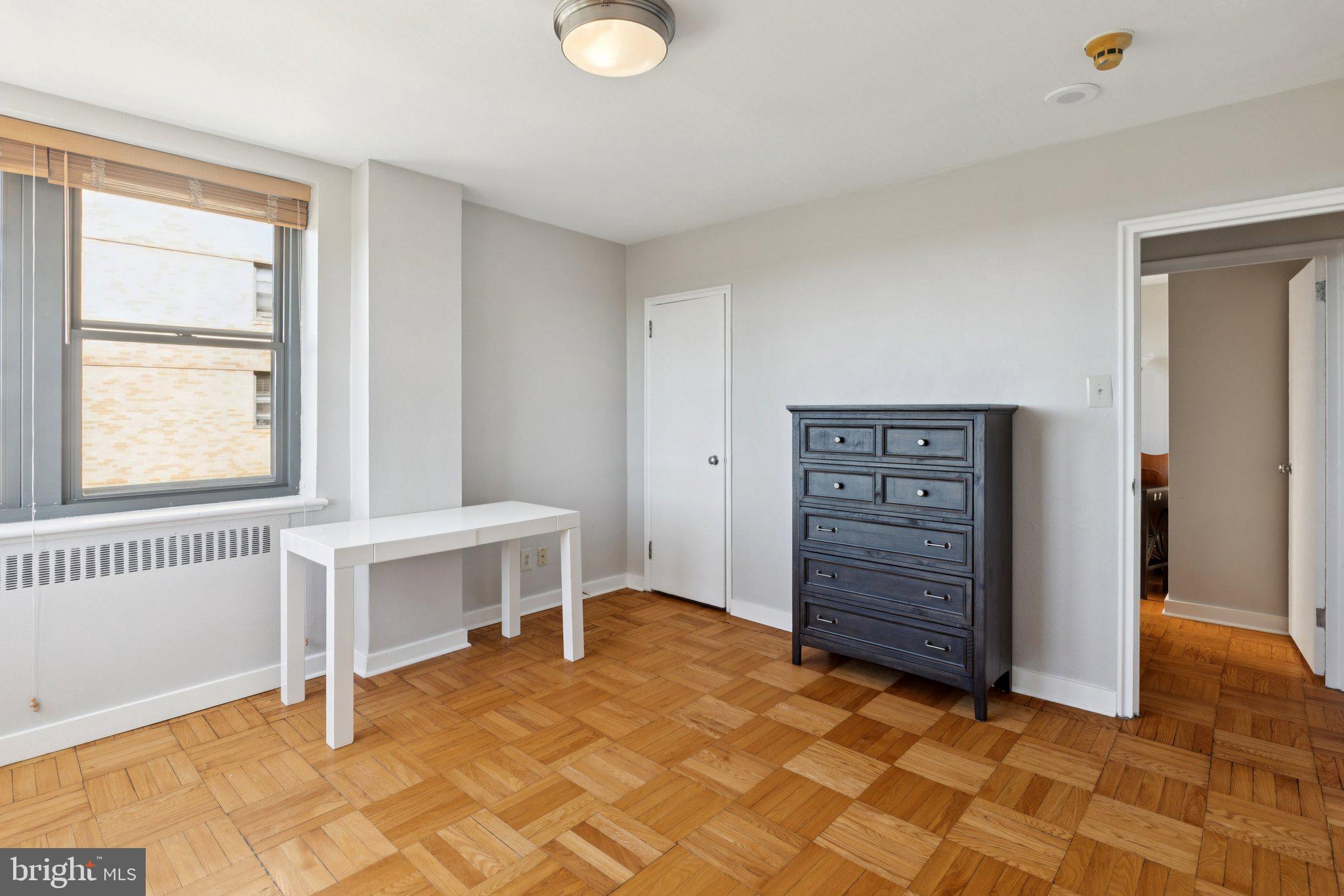2601 Pennsylvania Avenue, Unit 848 Philadelphia, PA 19130 - Photo 9 of 12 a view of room with cabinet and windows