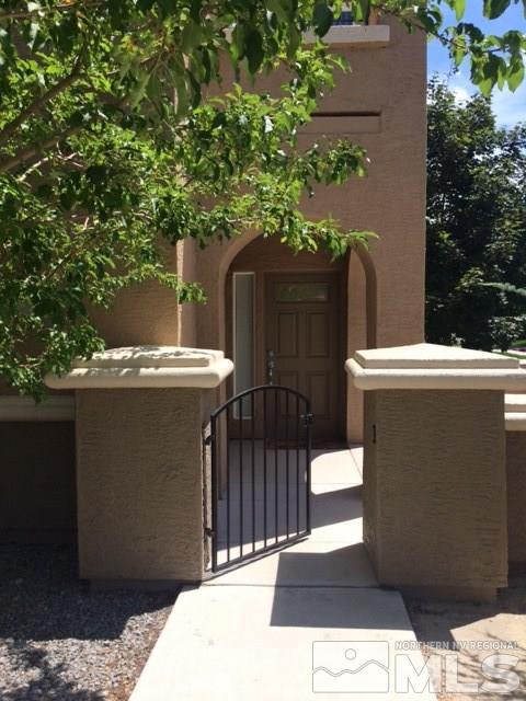 9050 Double R Boulevard, Unit 312 Reno, NV 89521 - Photo 1 of 1 a view of outdoor space and yard