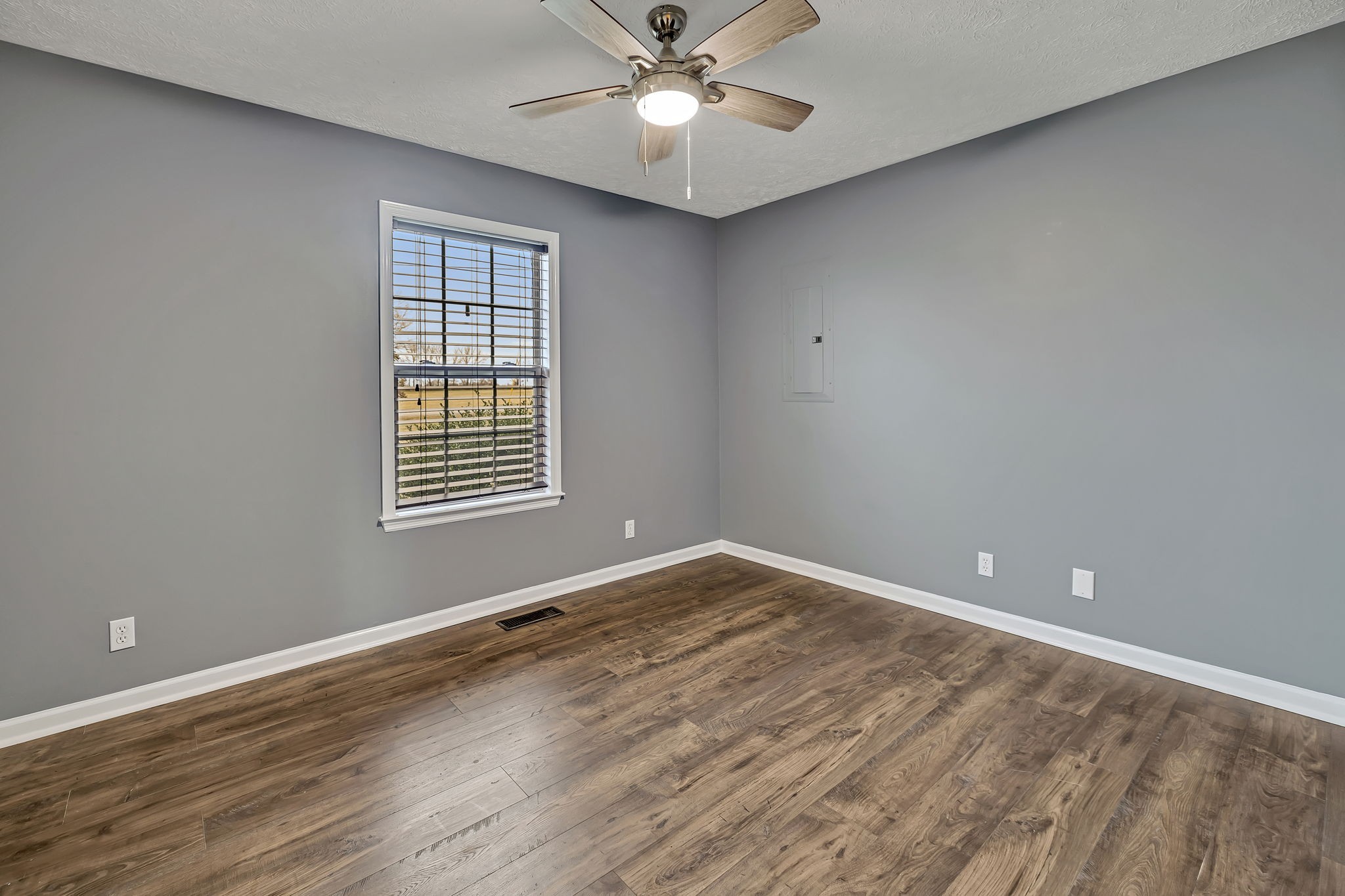 153 Spry Road Morrison, TN 37357 - Photo 11 of 19 wooden floor in an empty room with a window
