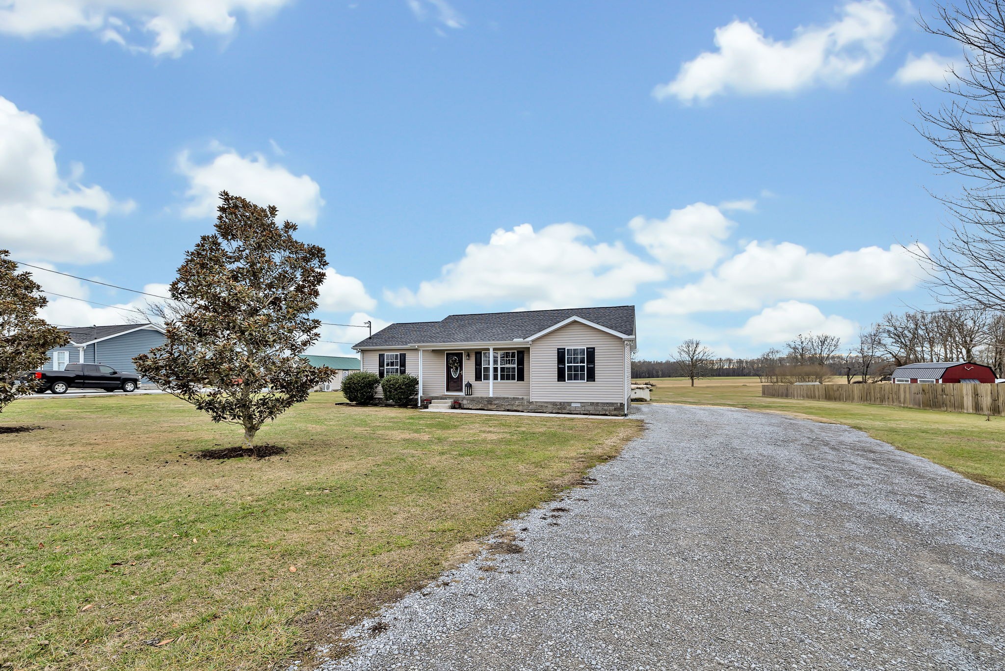 153 Spry Road Morrison, TN 37357 - Photo 19 of 19 a view of a house with a yard