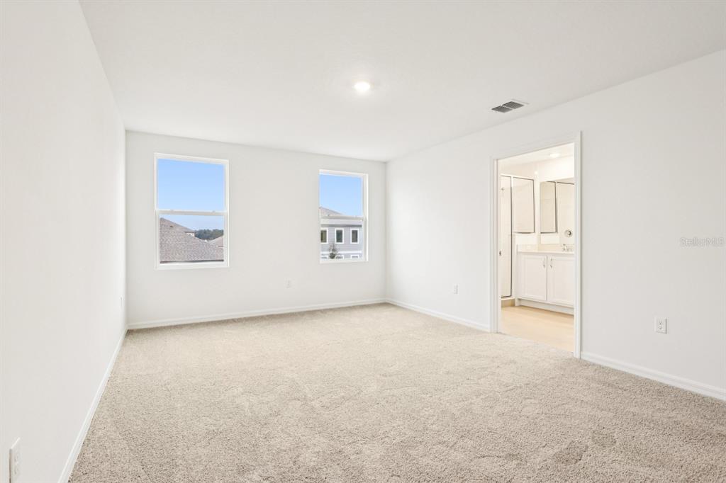 30158 Rustic Mill St Mount Mount Dora, FL 32757 - Photo 26 of 41 an empty room with windows