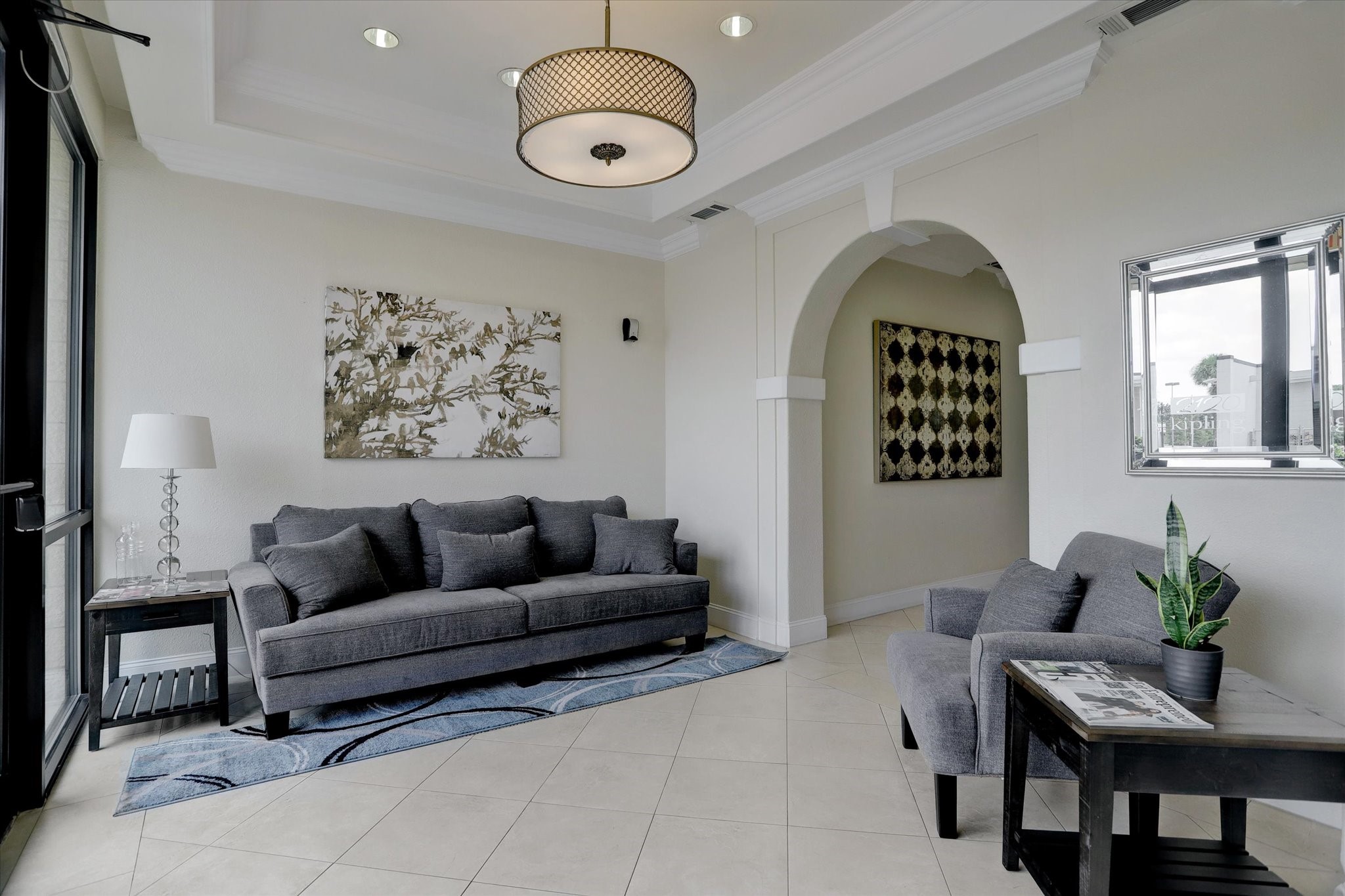 2120 Kipling Street, Unit 304 Houston, TX 77098 - Photo 22 of 24 Upon entry into the limited access building, there is a light filled lobby with sitting room.