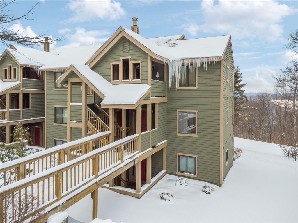 5228 Summit View Hidden Valley, PA 15502 - Photo 29 of 40 a front view of a house with a yard