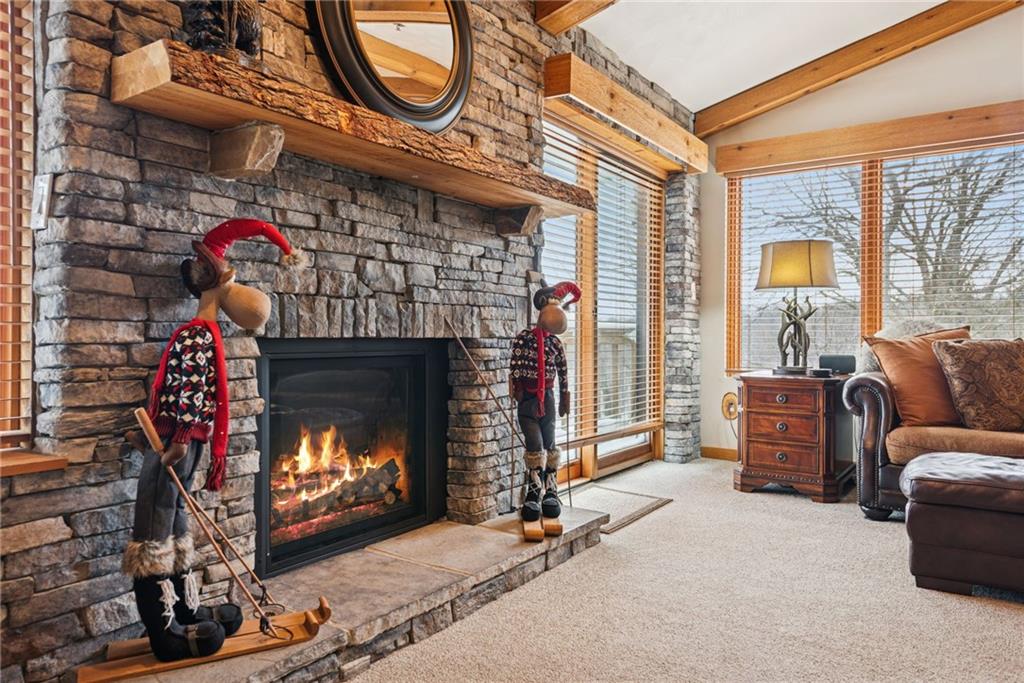 5228 Summit View Hidden Valley, PA 15502 - Photo 5 of 40 a living room with furniture a fireplace and a floor to ceiling window