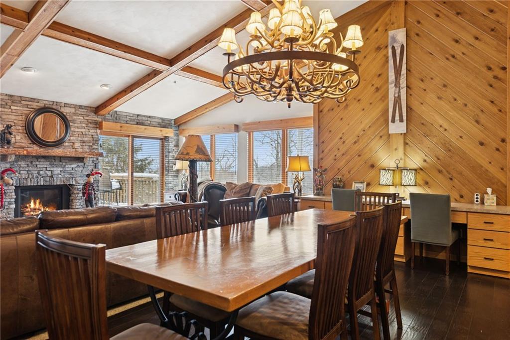 5228 Summit View Hidden Valley, PA 15502 - Photo 7 of 40 a view of a dining room with furniture window and wooden floor