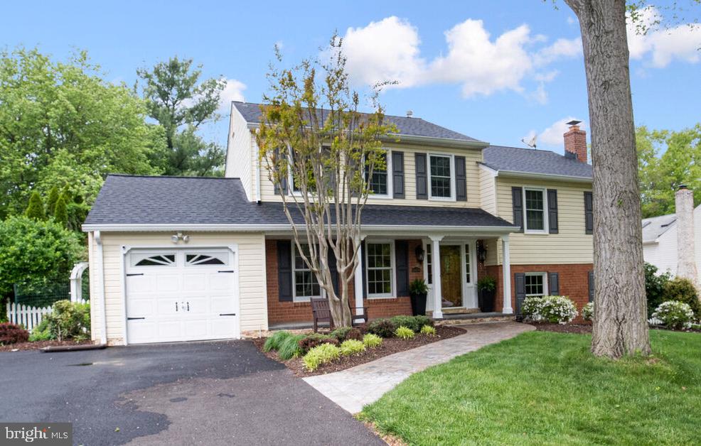 19404 Dubarry Drive Brookeville, MD 20833 - Photo 1 of 40 front view of a house with a yard