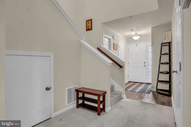 a room with stairs and furniture