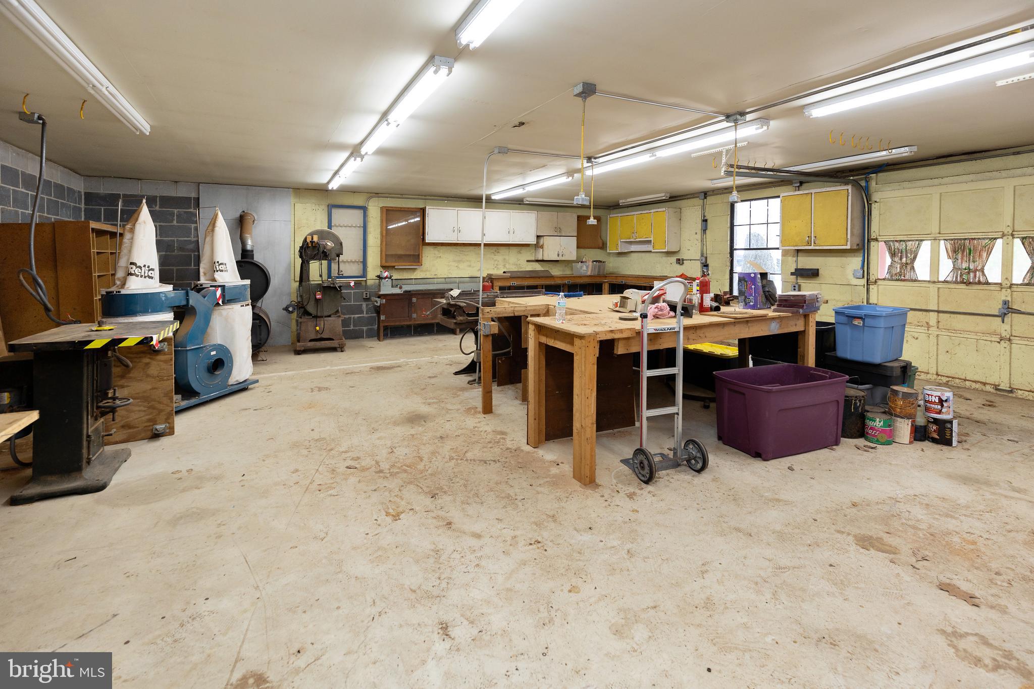 78 Diamond Avenue Pine Hill, NJ 08021 - Photo 11 of 36 a room with lots of furniture and clutter