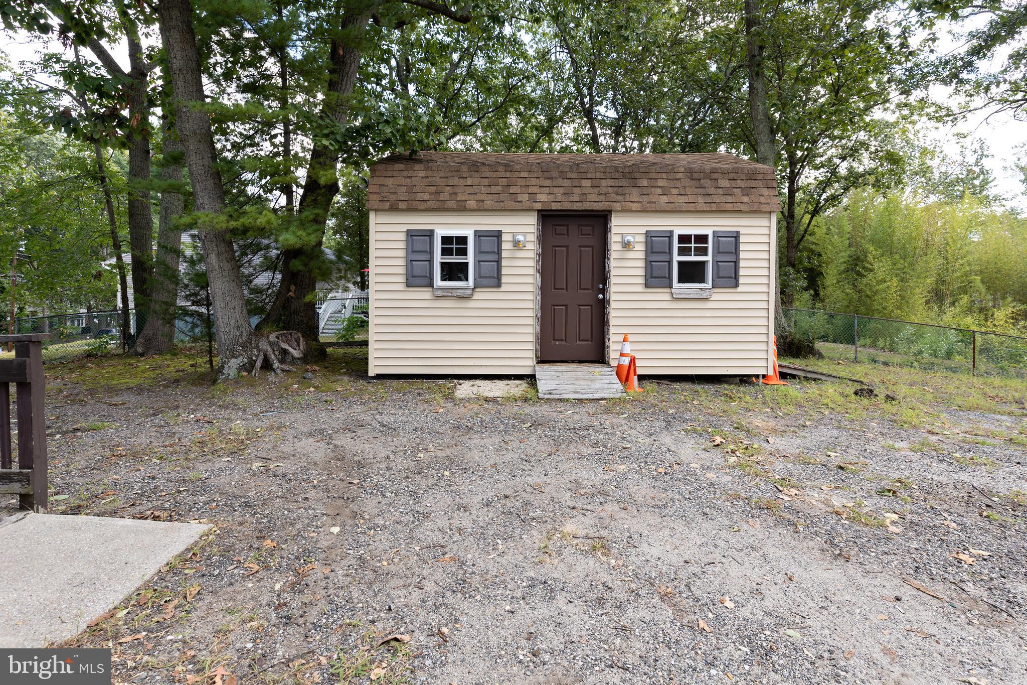78 Diamond Avenue Pine Hill, NJ 08021 - Photo 13 of 36 a view of a house with a yard