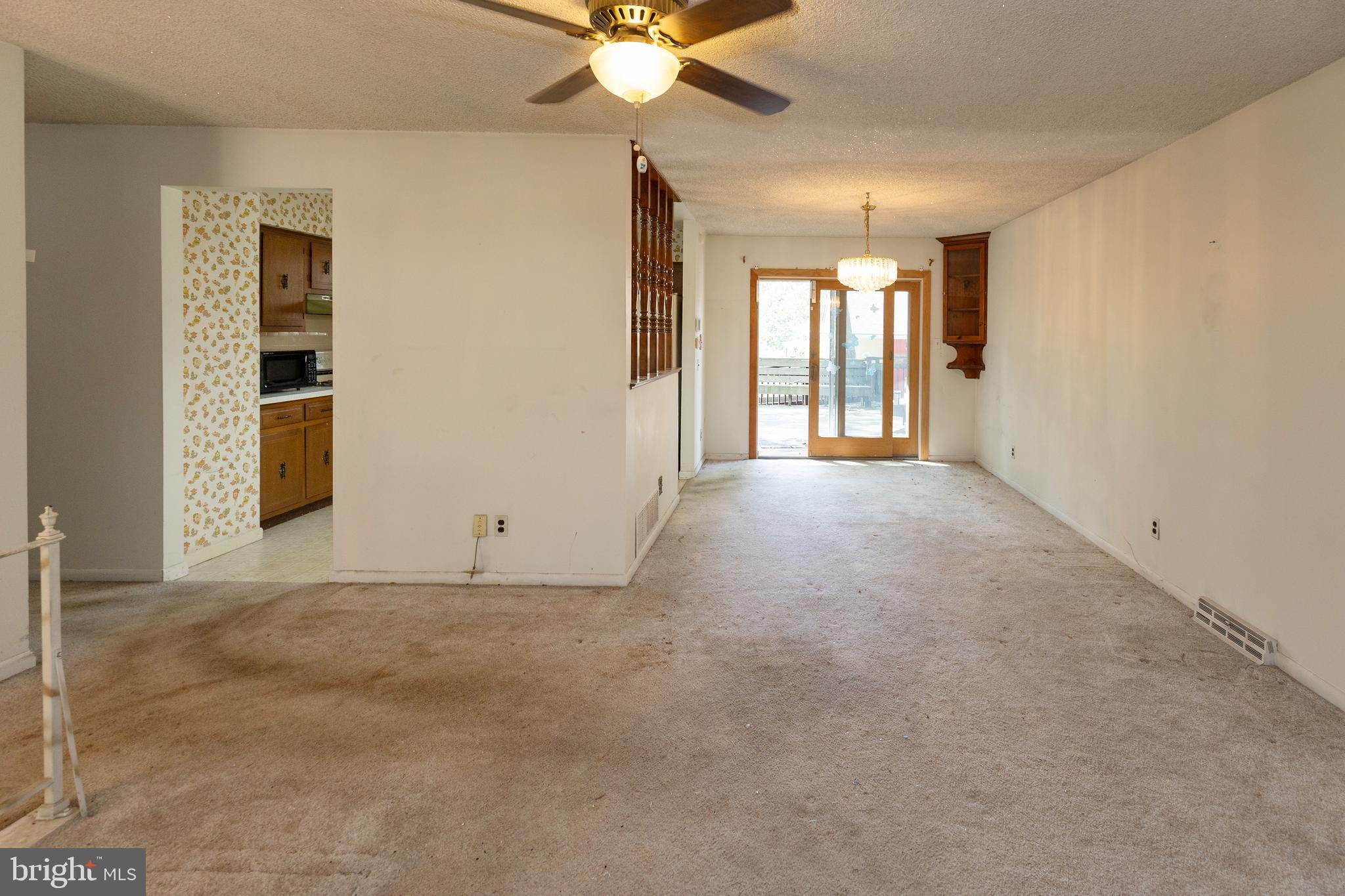 78 Diamond Avenue Pine Hill, NJ 08021 - Photo 15 of 36 en view interior of a house with a ceiling fan and window