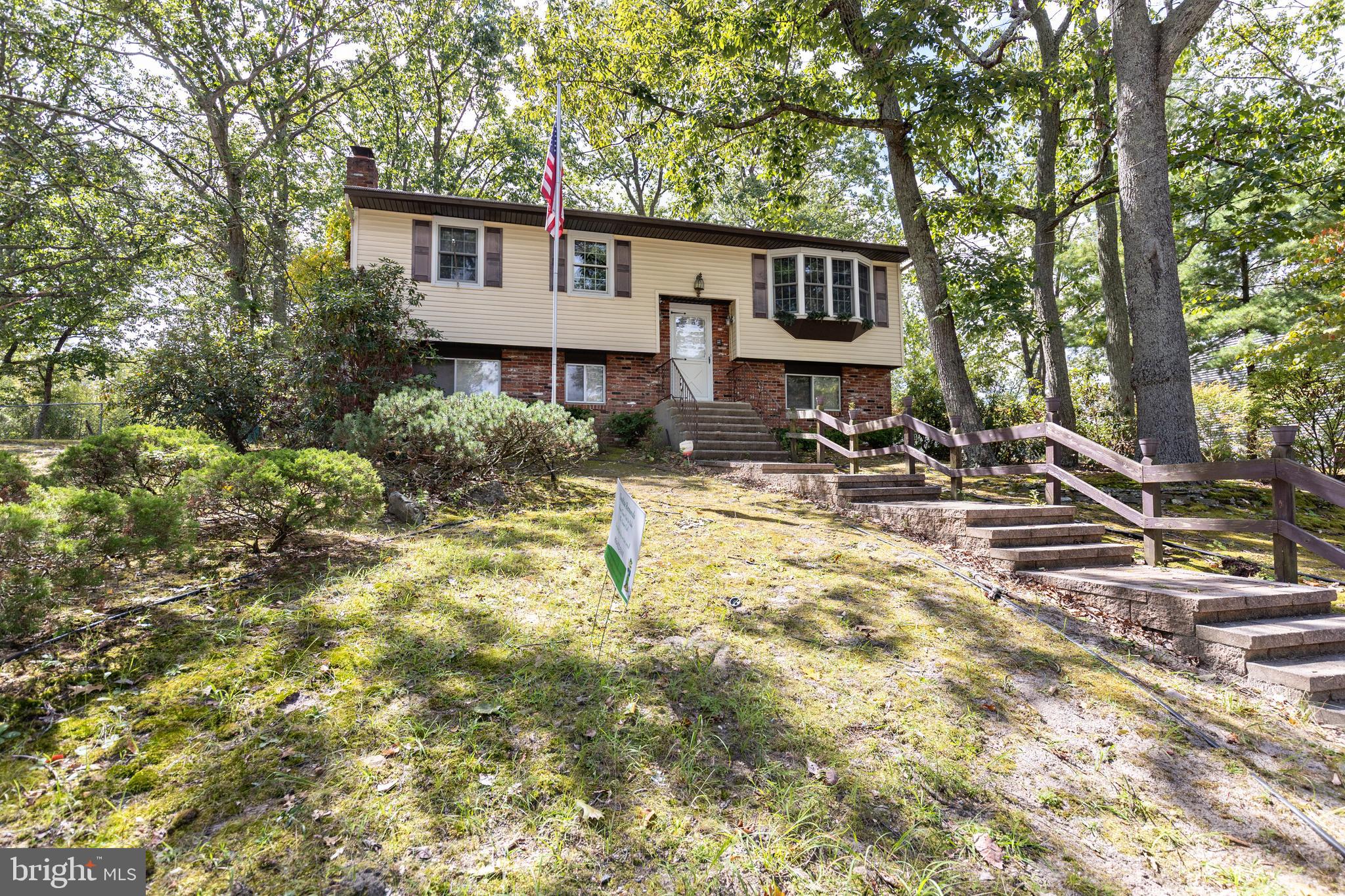78 Diamond Avenue Pine Hill, NJ 08021 - Photo 2 of 36 a view of a chairs in front of house