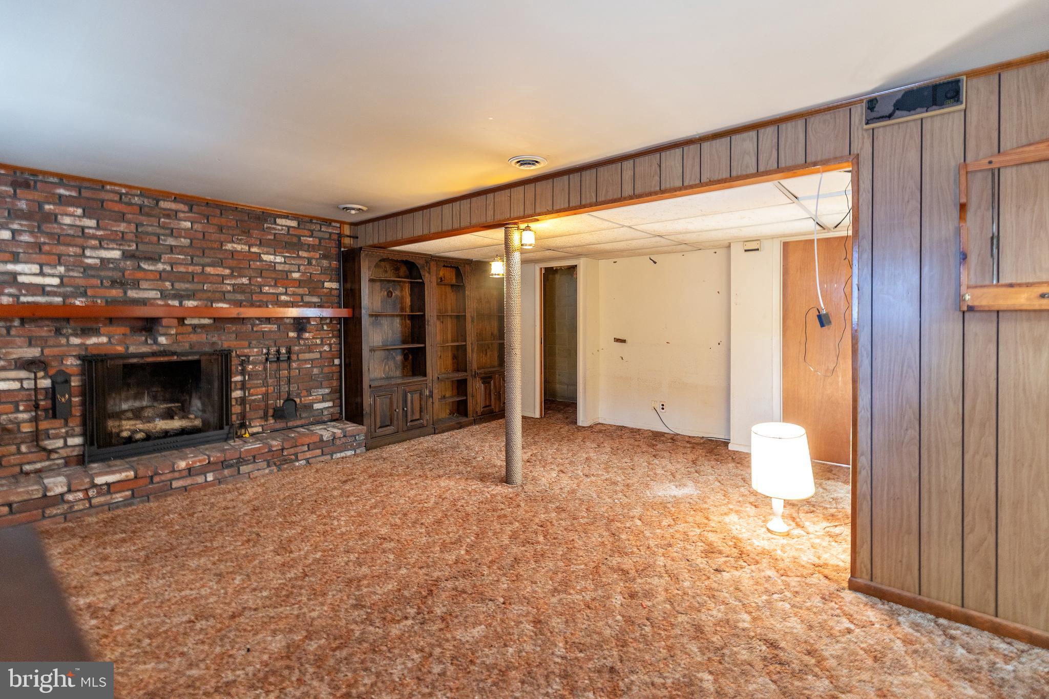 78 Diamond Avenue Pine Hill, NJ 08021 - Photo 25 of 36 a view of a livingroom with a fireplace