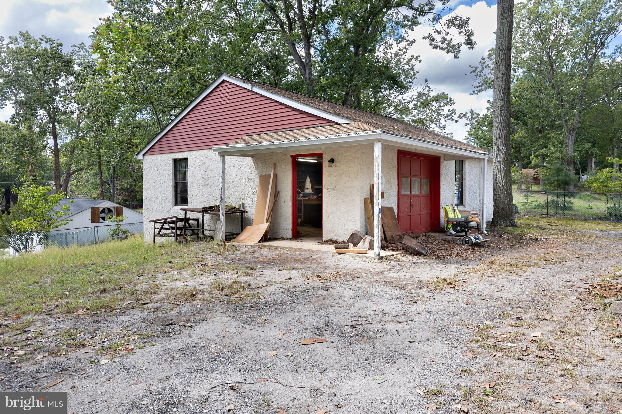 78 Diamond Avenue Pine Hill, NJ 08021 - Photo 6 of 36 a view of a house with yard and a garden