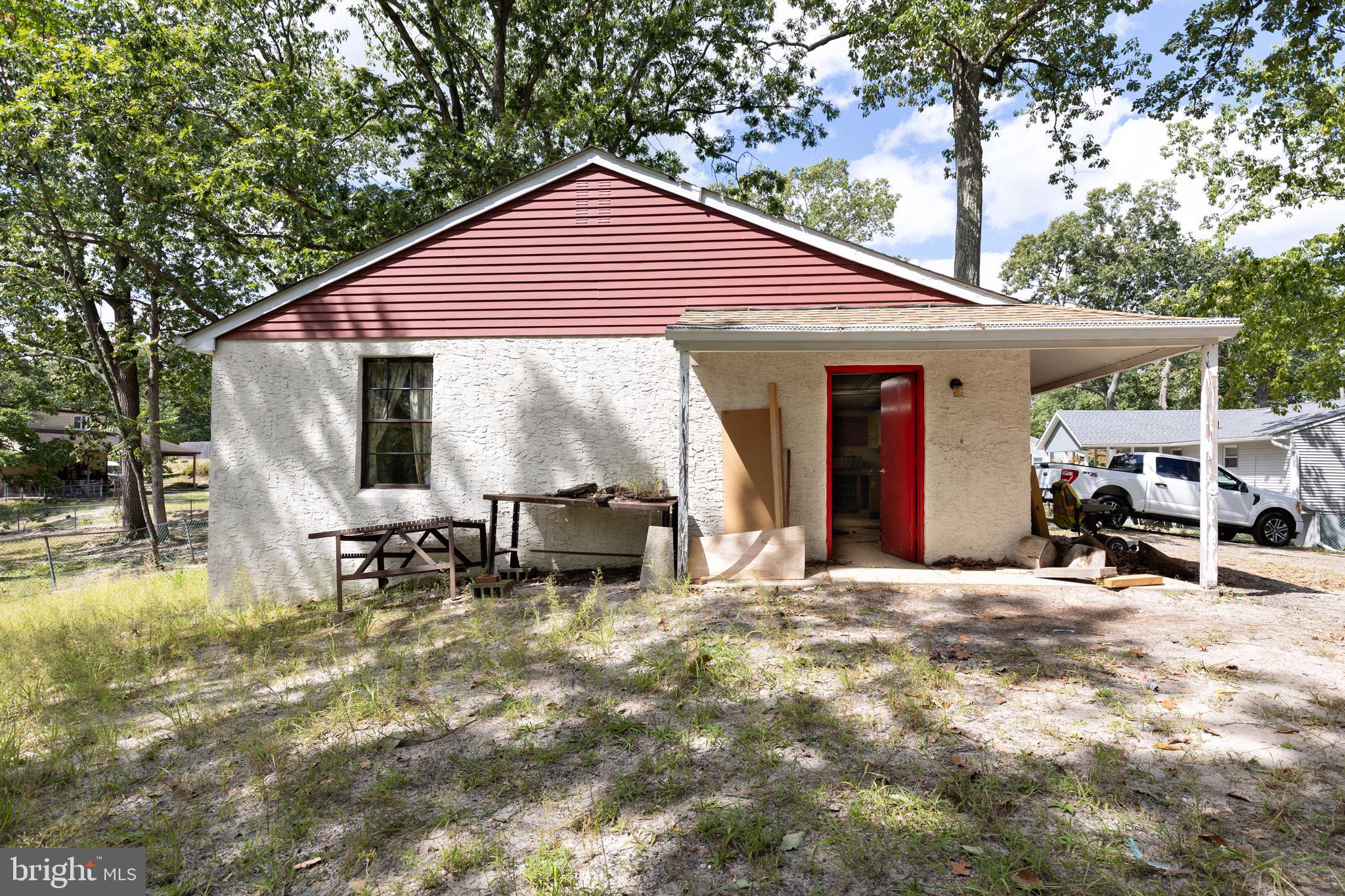78 Diamond Avenue Pine Hill, NJ 08021 - Photo 8 of 36 a view of a house with backyard porch and sitting area