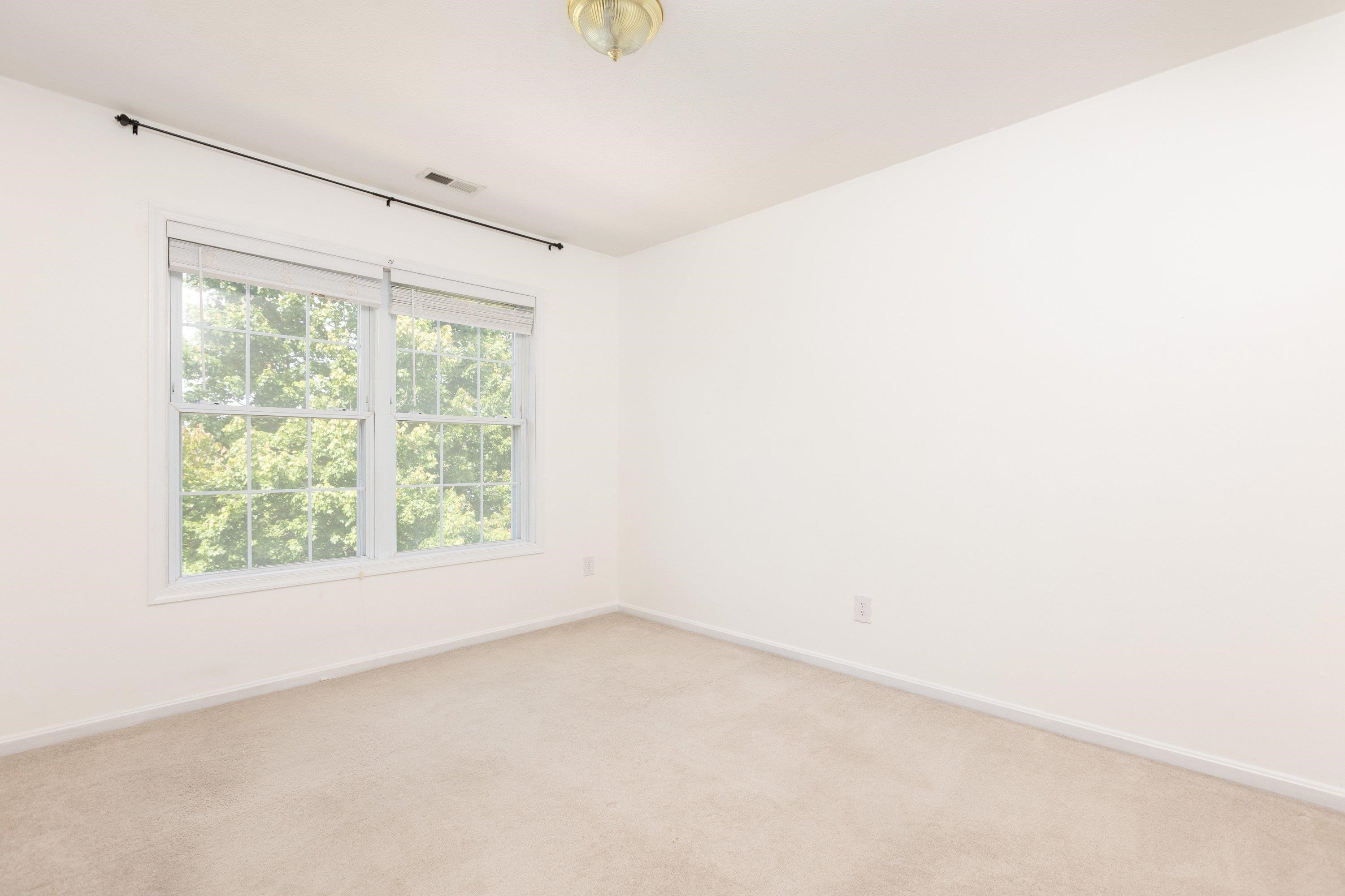 536 Three Leagues Road McGaheysville, VA 22840 - Photo 28 of 71 This third bedroom, on the upper level of the home, features comfortable flooring, vanity with storage, and much more!