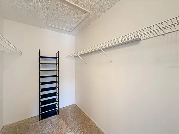 a bathroom with a sink mirror toilet and shower