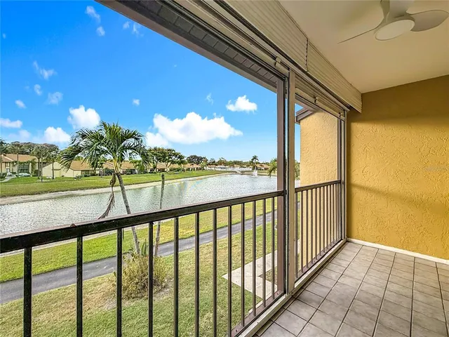 a view of a lake with a big yard