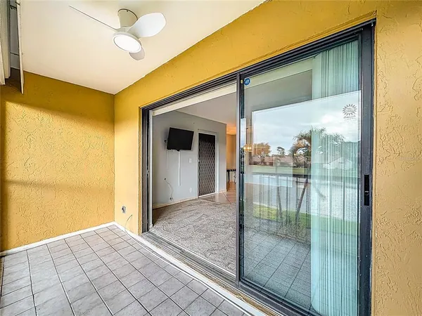 a view of a hallway with a shower