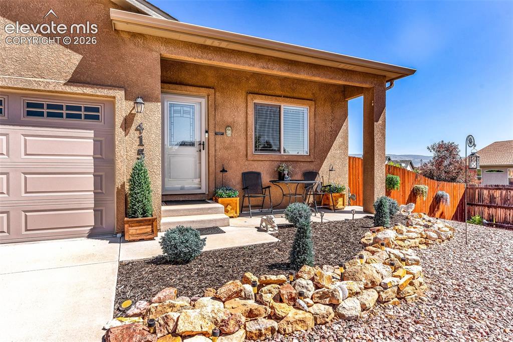 415 Empire Road Canon City, CO 81212 - Photo 7 of 40 a view of a lounge chair in the patio